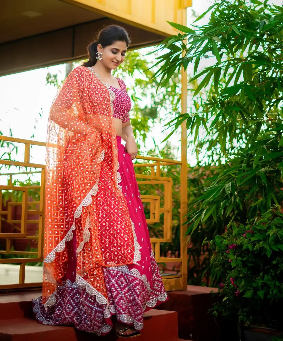 Varshini Sounderajan Wearing Orange Lehenga Choli